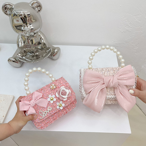 kids lucky bagthe new south Korean version of the bowknot pearl cotton and linen cloth son female children laptop accessories hand bag bag handbag