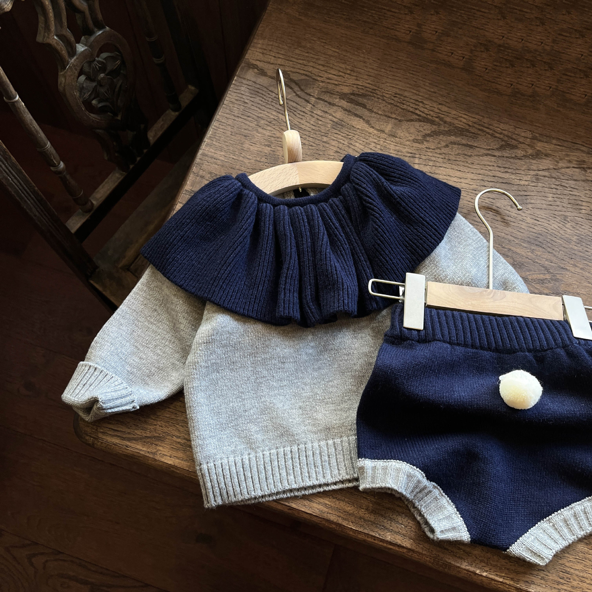 Estilo coreano primavera nuevo collar de loto Super lindo punto superior conejo cola pantalones cortos estilo occidental traje de niña