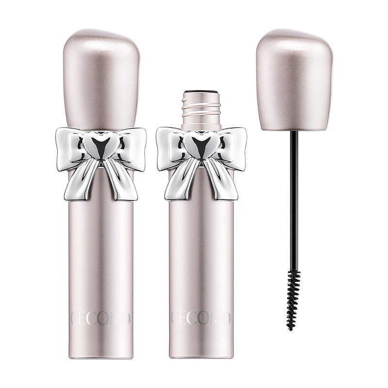 GECOMO es un maquillaje de belleza transfronteriza para mujeres con un maquillaje grueso y largo.