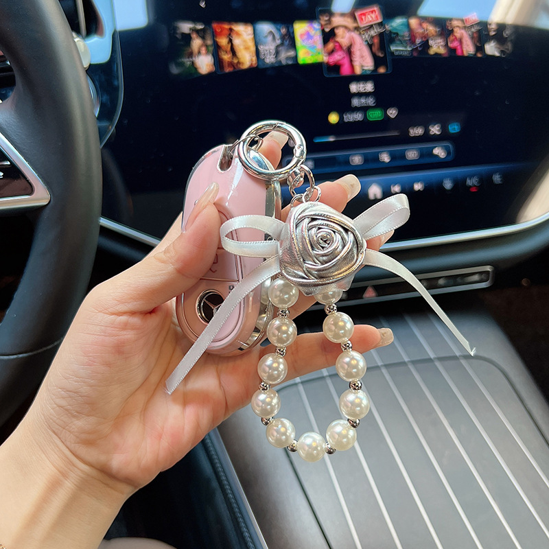Cuero pu pequeño rosa llavero perla arco flores coreana llavero de automóvil bolso colgante bolso para mujeres