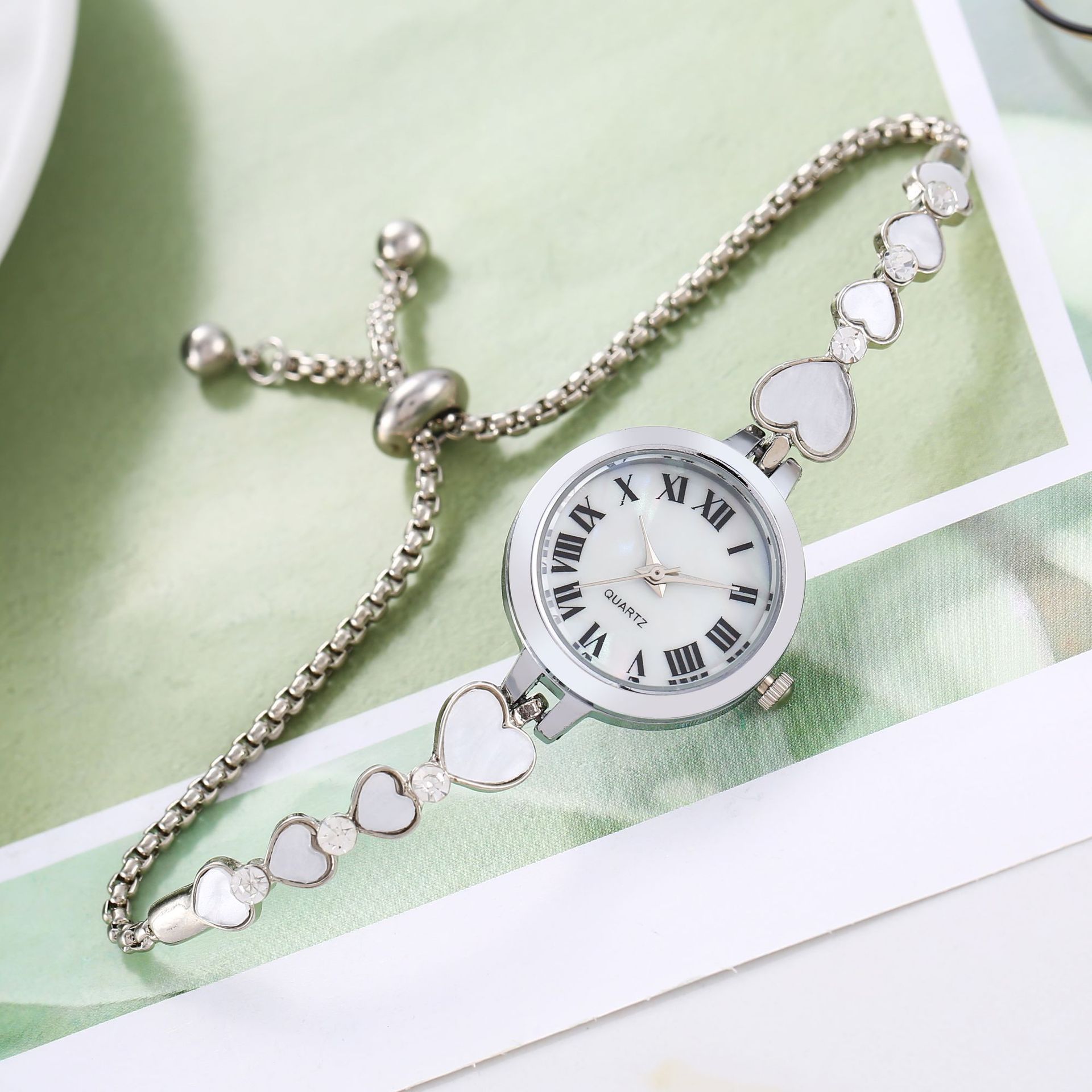 Mujeres con corazón pulsera reloj rhinestone Shell pequeño dial pulsera reloj retráctil ajustable reloj