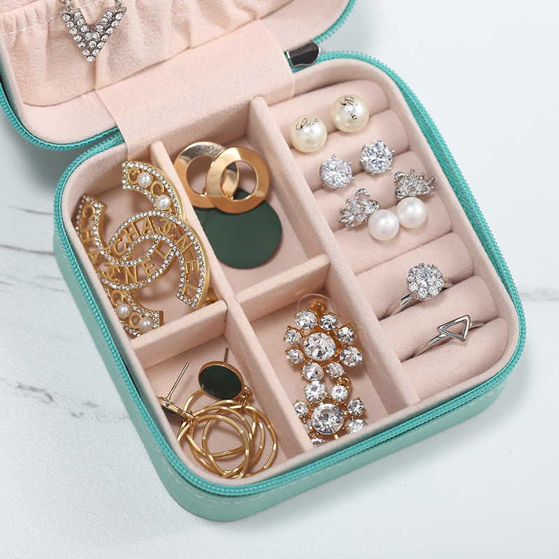 Suministro directo transfronterizo de cajas de joyería de alta calidad, cajas portátiles para anillos, cajas para pendientes, cajas de almacenamiento de joyería para viajes.