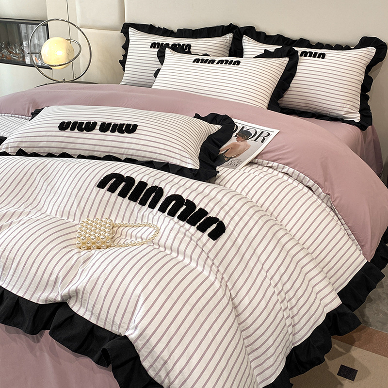 2024 nuevo estilo francés pequeño bordado de toalla de fragancia cuatro piezas funda de edredón sábana simple ropa de cama Nantong al por mayor