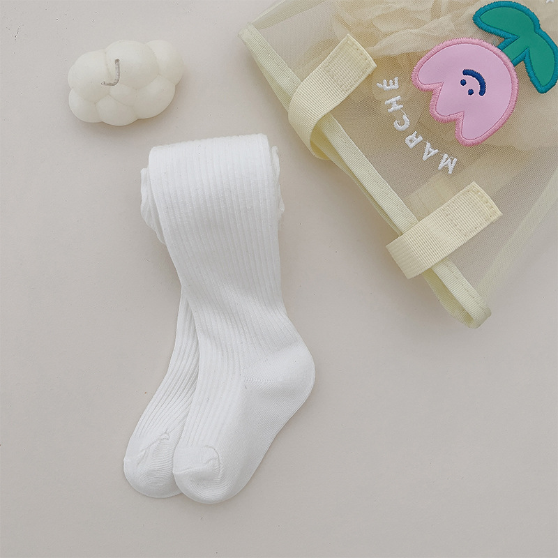 Nuevo color sólido rayas verticales polainas de las muchachas del otoño y el invierno estilo coreano ocasional los niños ropa exterior pantimedias blancas en stock