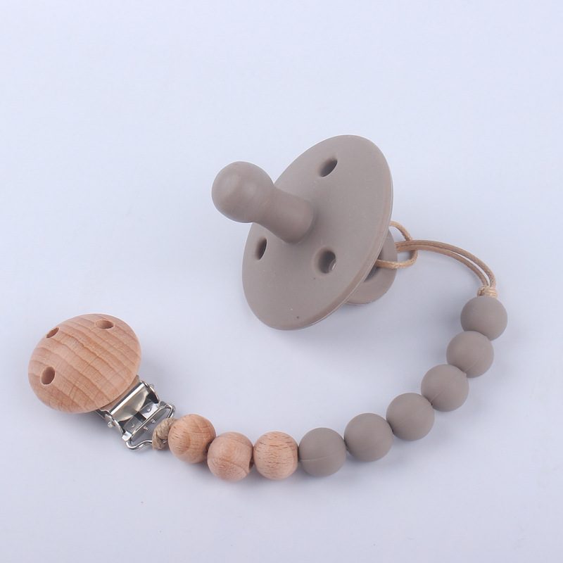 Nuevos suministros para bebés chupete bebé pezón de silicona creativo bebé mordida Cadena de pezón de silicona conjunto de dos piezas