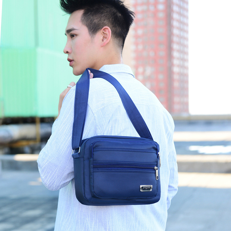 Seis capas de estilo coreano bolso de hombro de los hombres de viaje casual todo partido moda logotipo imprimible impermeable negocio de recogida de dinero bolso de hombro