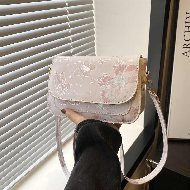 Bolso de hombro de textura bolso de mujer 2024 otoño nuevo estilo hermoso mariposa impresión de moda mochila casual bolso pequeño