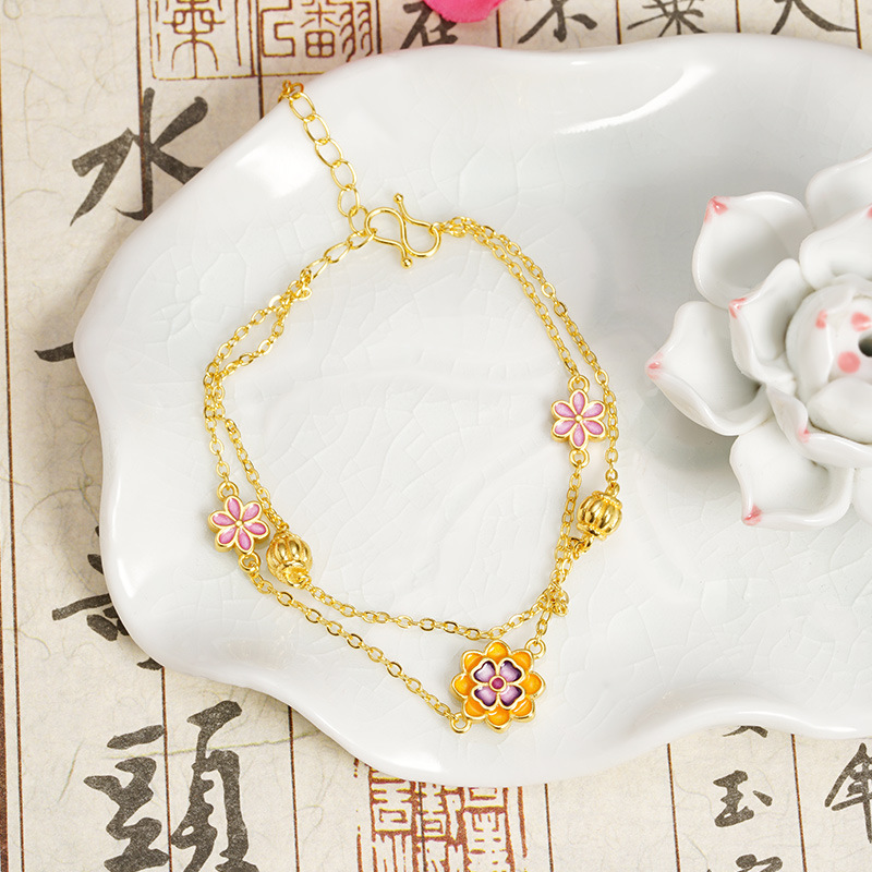 Nueva pulsera de oro antiguo estilo chino estilo nacional esmalte color loto goteo flor de melocotón pulsera nicho joyas de alta calidad