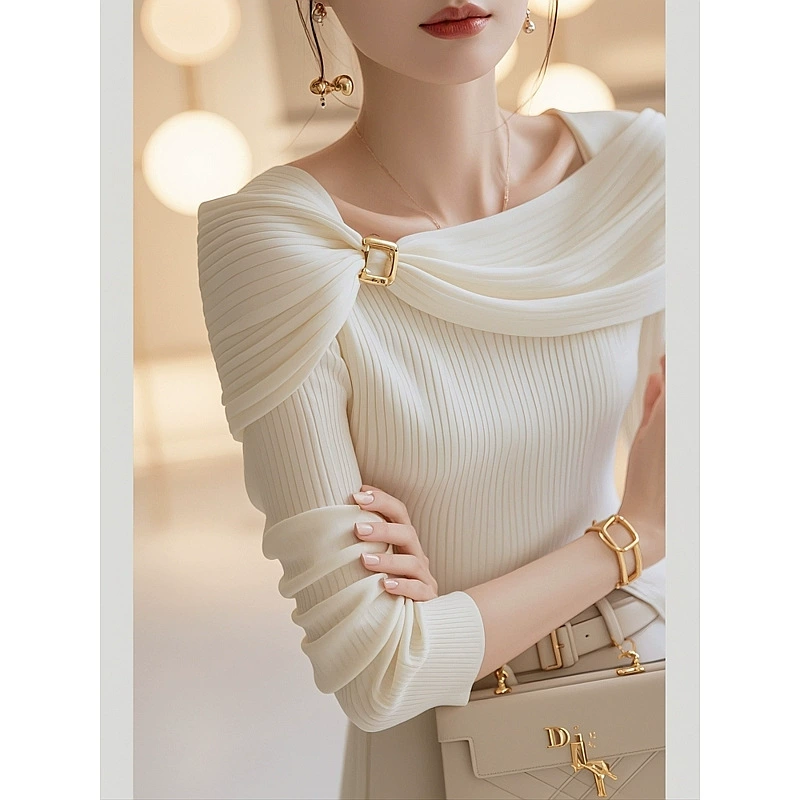 2024 Ранняя осень белый вязаный свитер женский дизайн чувство нишу высокий уровень уникальный и шикарный темперамент красивый топ с длинными рукавами