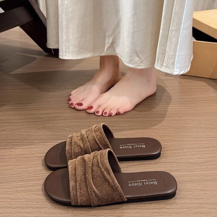 Nicho francés pliegue zapatillas planas de verano para mujeres 2026 nuevas zapatillas de playa de vacaciones