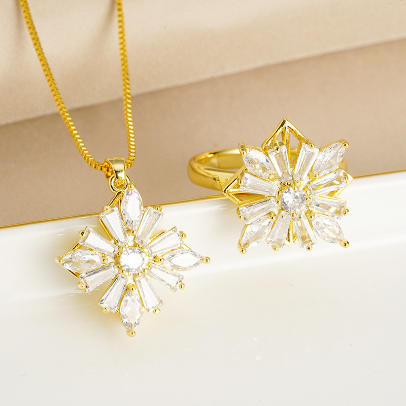 Nuevo oro de arena collar de flores de molino de viento geométrico mujer lujo ligero viento frío nicho joyería anillo fuente al por mayor