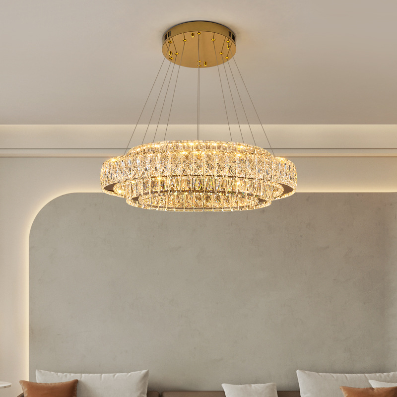 2025 nuevo candelabro de sala de estar atmosférico de alta gama estilo de lujo ligero candelabro de cristal de anillo redondo dormitorio candelabro de comedor