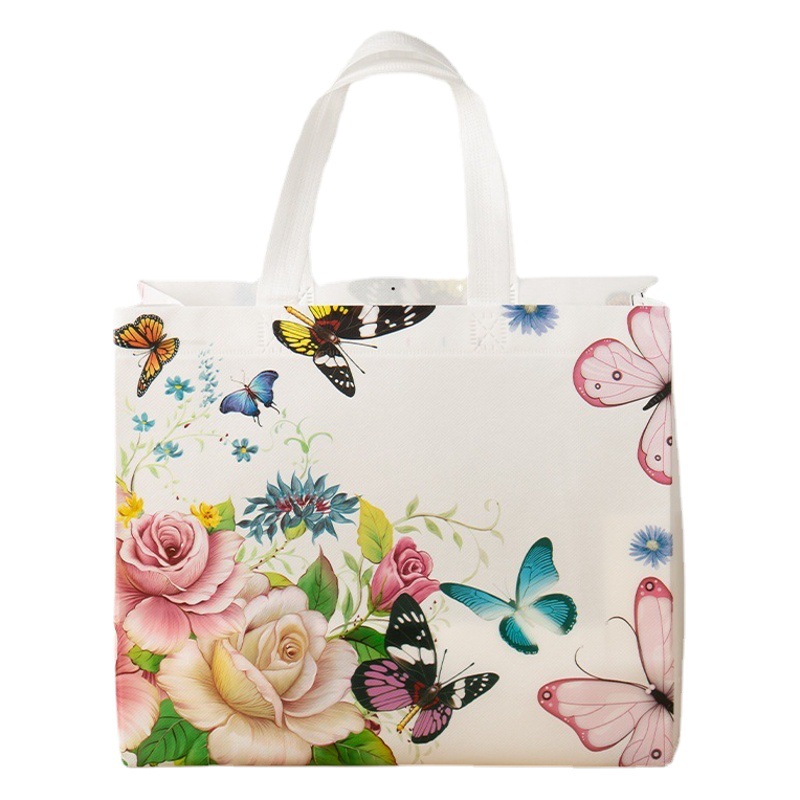 En stock prensado en caliente película horizontal no tejido bolsa tienda de ropa al por mayor compras publicidad bolso color impresión logo