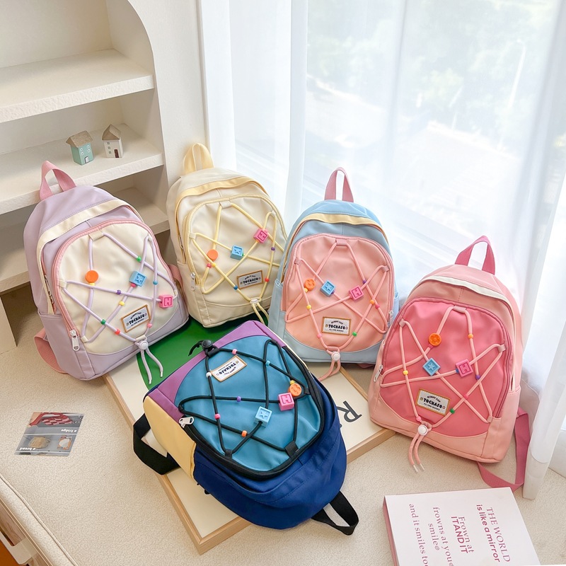 Bonita pequeña estrella mochila para niños y niñas estilo extranjero color de choque bolsas escolares para estudiantes de jardín de infantes nuevas mochilas para niños de cuerda de tracción
