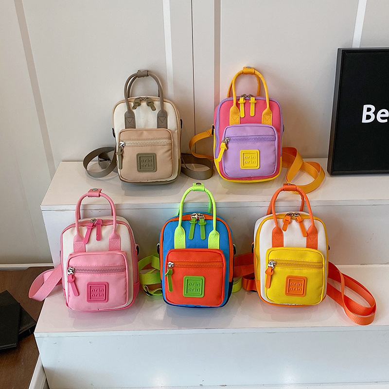 Nuevo mini mochila infantil multifuncional al aire libre bebé mochila de moda de color contraste bolso de hombro para hombres y mujeres
