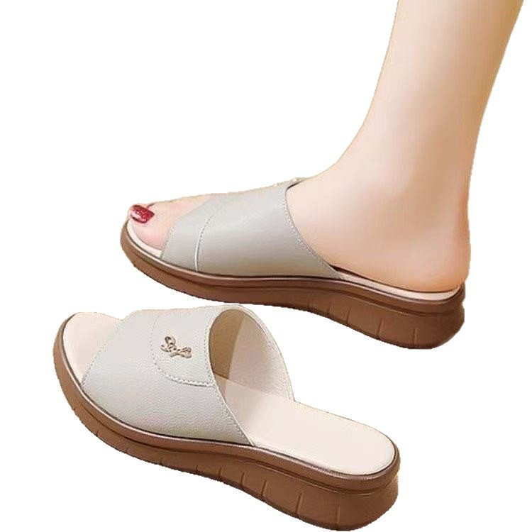Zapatillas de cuero suave para mujeres 2026 verano nuevos zapatos de suela suave para madres zapatillas de playa de moda para mujeres casuales