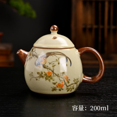 エナメル色の精巧なティーポットの高級な茶器家庭用陶磁器のティーポットの龍卵壺の茶器は卸売りできます。