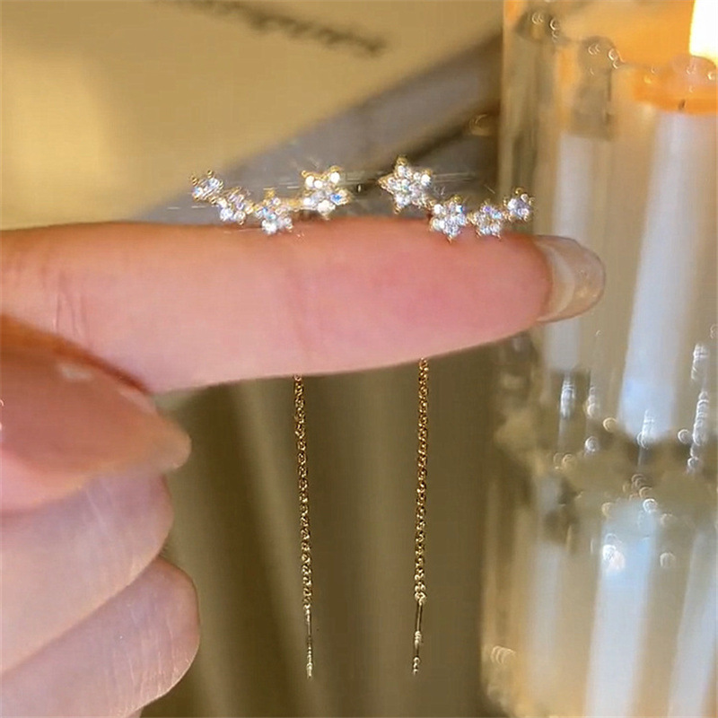 S925 aguja de plata de alta calidad estrella cadena borla oreja línea pendientes de las mujeres de lujo de la luz exquisita todo partido moda oído joyería