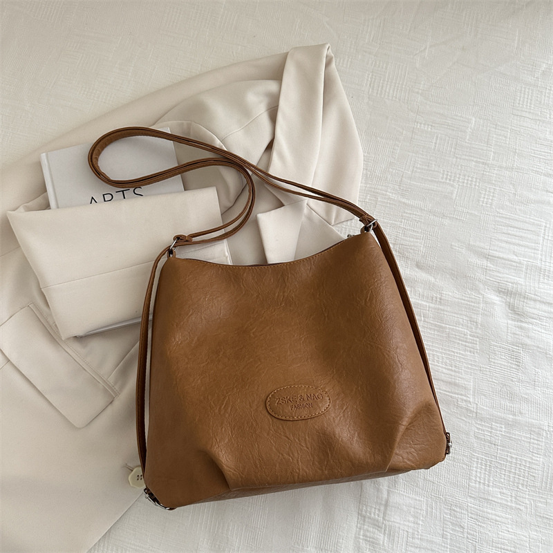 Gran capacidad de transporte popular ocio 2024 retro nuevo estilo de tendencia de color sólido multifuncional bolso de hombro para mujer