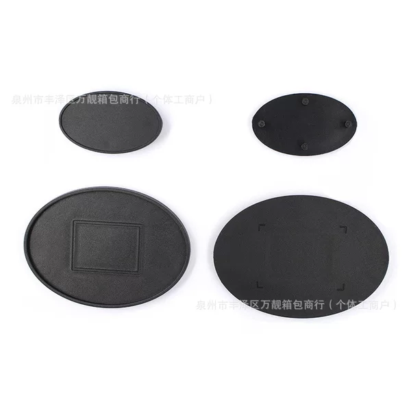 Directly from the manufacturer, oval black plastic POM backpack logo frame with an inner diameter of 56mm, rubber luggage nameplate accessories
