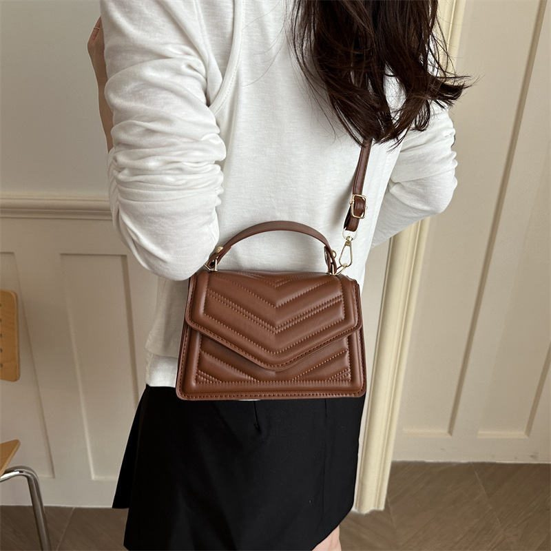 Bolso de mano para mujeres 2026 verano nuevo nicho de tendencia bolso de hombro bolso de viaje casual mochila bolso de moda