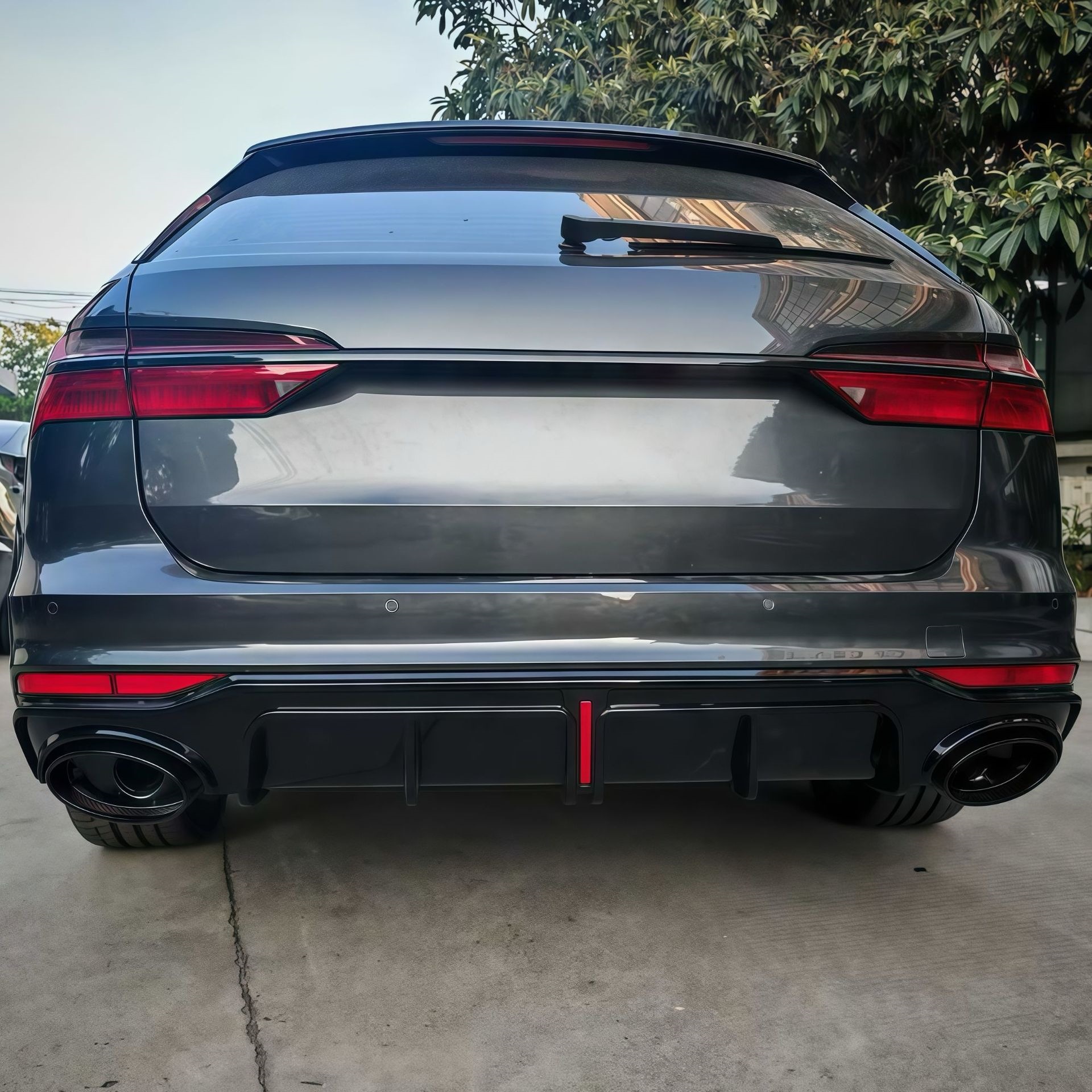Suitable for Audi A6 Allroad models from 2019 to 2025, this includes a modified rear lip, exhaust tips, and a black "Black Warrior" lower lip