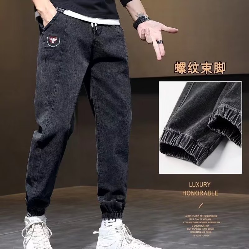 Otoño marca de moda Harlan jeans pantalones de pies pequeños de estilo coreano para hombres pantalones elásticos sueltos de otoño e invierno con cintura elástica para hombres