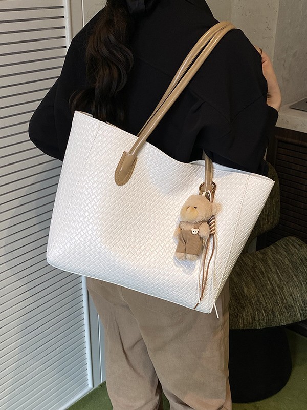 Bolsa de moda retro de gran capacidad para mujeres 2025 nueva bolsa de hombro transfronteriza simple textura casual bolso de abrigo