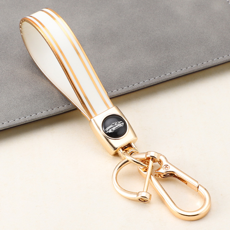 Cuerda de mano de silicona transfronteriza llavero de coche logotipo de coche apellido llavero anti-pérdida llavero de cuerda de mano de silicona duradera