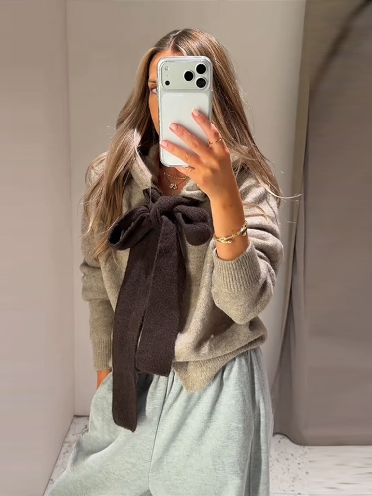Moda coreana estilo casual de color sólido encapuchado suéter de arco cardigan 2025 cruzado Europa y los Estados Unidos nuevo caliente