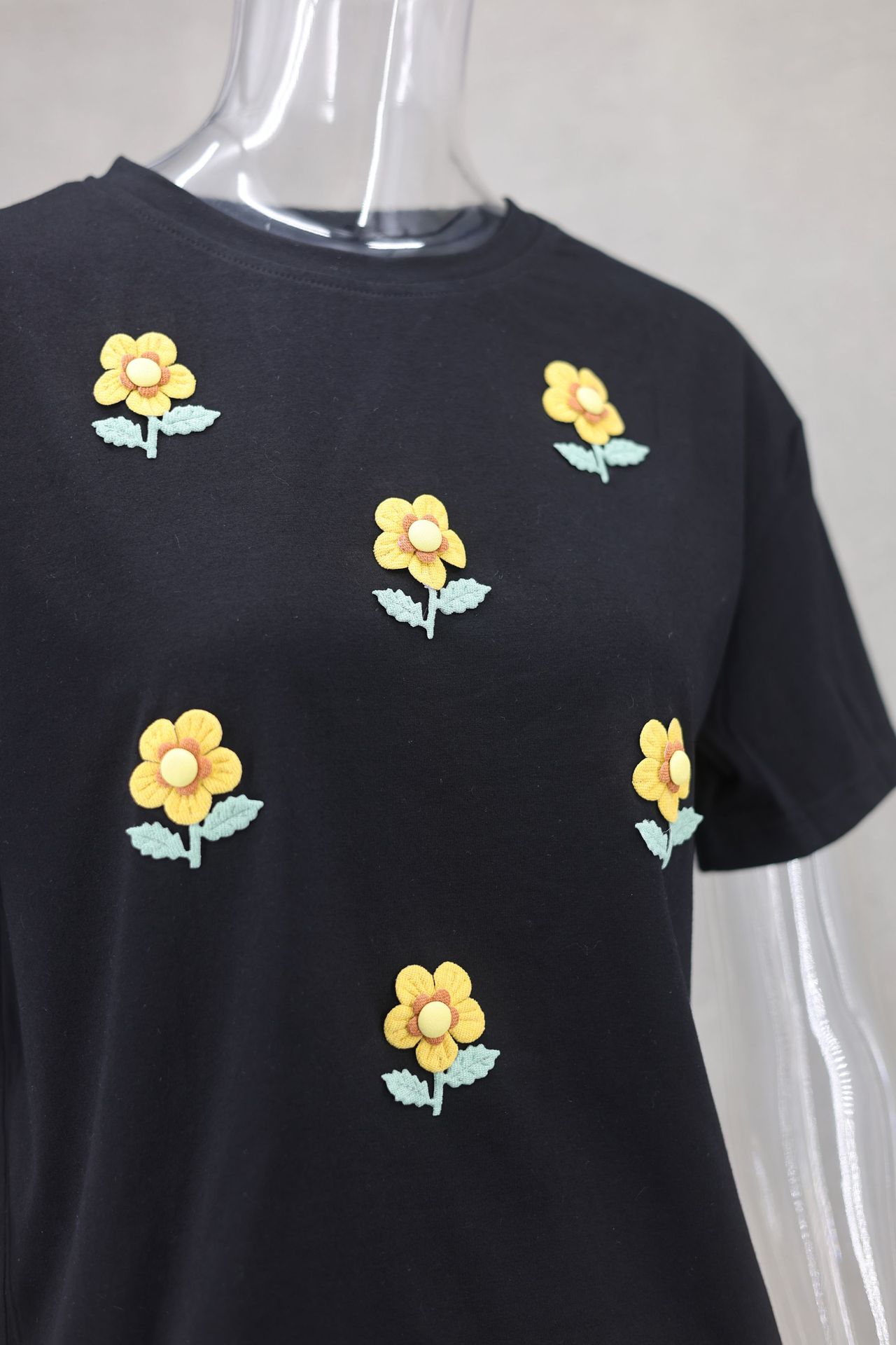 140g Weight Short Sleeve Sleeve Length Pullovers Placket Type Regular Sleeve Sleeve Type Polyester Fabric Type Regular Top Length T-shirt Tops Type Daily Occasion Round Neck Neckline Loose Fit Type Flower Pattern Summer Season Women's Gender Casual Style Wholesale Women's Casual Flower Short Sleeve T-Shirts 14