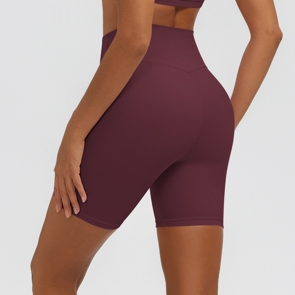 Nuevo tipo delgado de hielo, piel transpirable, ajustado, color sólido, ropa de yoga, pantalones cortos de tres puntos.