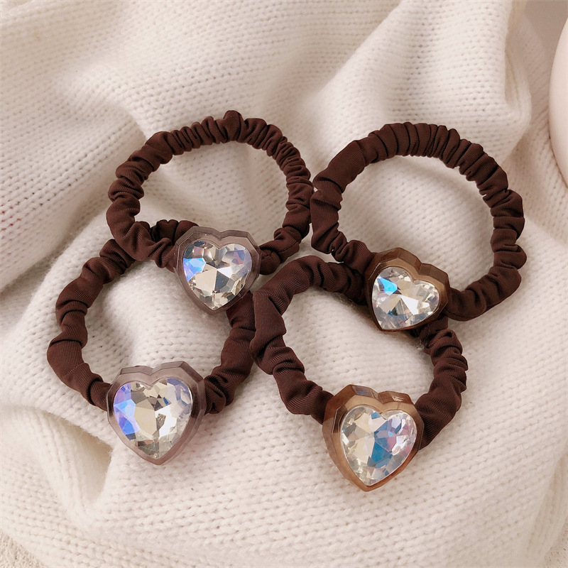 Temperamento retro cuerda de tela negra mujer amor cristal anillo de pelo intestino grueso cabeza detrás de la cuerda de cabello joyas de cabello de cola de caballo