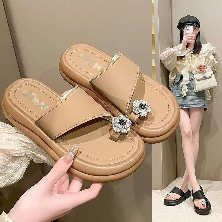 2026 verano nuevo estilo simple de moda de vacaciones de hadas sandalias de playa de viento de dedos de los dedos para usar zapatillas frías para mujeres