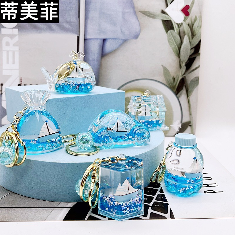Oil-in Marine sailboat floating bottle keychain exquisite children's schoolbag ornaments car key chain ring couple pendant