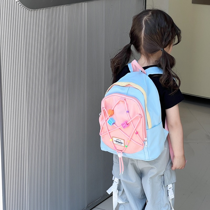 Bonita pequeña estrella mochila para niños y niñas estilo extranjero color de choque bolsas escolares para estudiantes de jardín de infantes nuevas mochilas para niños de cuerda de tracción