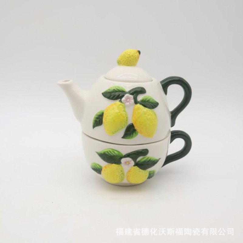 Ceramic Western-style milk jug and teapot, exported dolomite embossed lemon cup and pot, painted fruit cup and pot set Ceramic Western-style milk jug and teapot, exported dolomite embossed lemon cup and pot, painted fruit cup and pot set