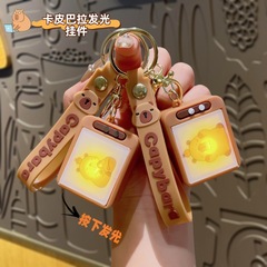 カピバラカピバラアニメーションページめくりキーホルダークリエイティブ減圧小さなおもちゃキーホルダースクールバッグペンダント人形