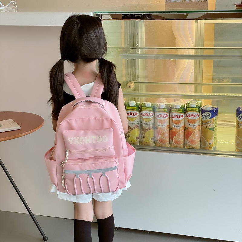 Mochila escolar coreana para niños y estudiantes con letras de color contrastante personales para reducir la carga de la mochila de jardín de infantes de gran capacidad