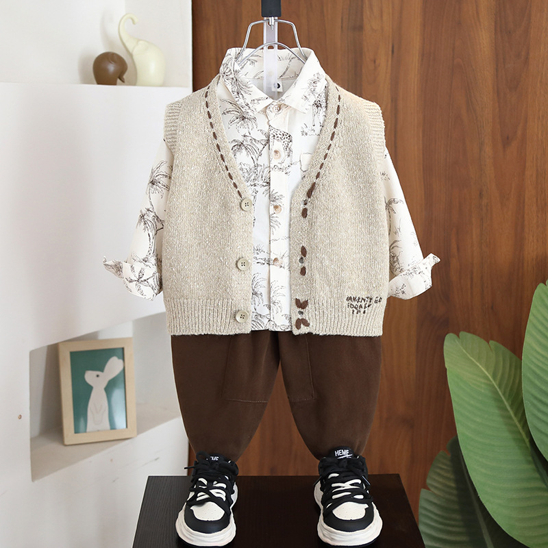 7073 traje de primavera para niños 2025 primavera y otoño nuevo suéter chaleco de punto traje de tres piezas ropa de bebé para niños