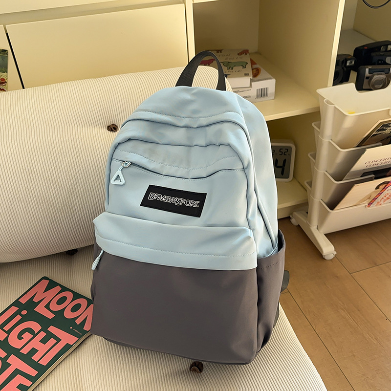 Nuevo paquete de dolor lindo de gran capacidad 2025 empalme de color de moda y viaje de ocio con 100 pares de hombros de alto valor facial inicial