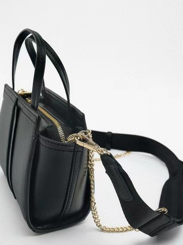 Moda transfronteriza nueva bolso de mujer bolso de mano red coreana esmalte brillante alas bolso de hombro