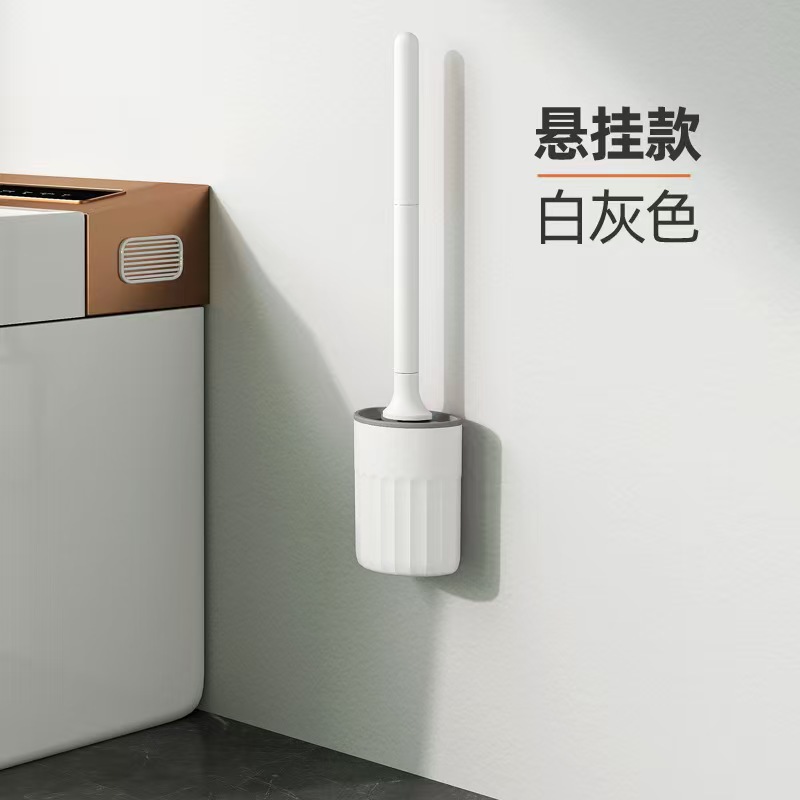 Nuevo cepillo de inodoro de silicona sin ángulo muerto de alto nivel con base colgante de pared tipo conjunto de almacenamiento alargado inodoro transfronterizo