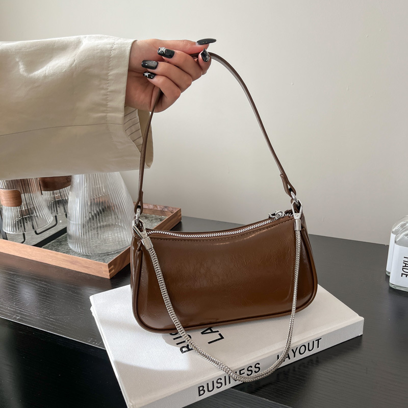 Bolso de axila retro de nicho francés para mujer 2025 nuevo bolso de bandolera con cadena de alta calidad portátil