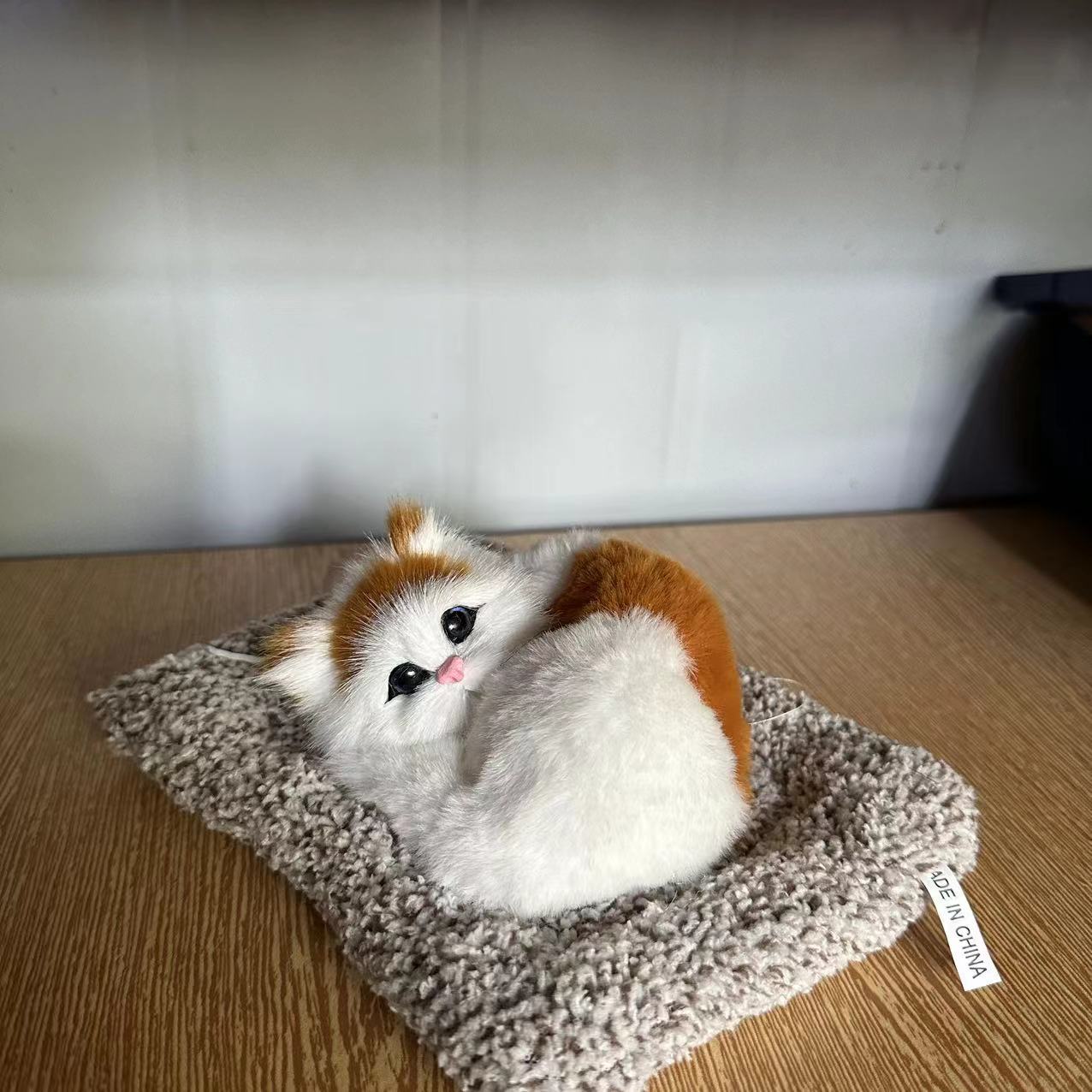 Fábrica de cabello recto imitación de carbón de bambú adornos de automóviles ojos abiertos adornos de interiores familiares para enviar regalos de aire purificado