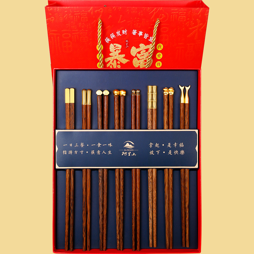 2025 nuevo juego de palillos de regalo de apertura, alitas de pollo de madera maciza para el hogar, palillos de madera, regalo de mano al por mayor, logotipo imprimible