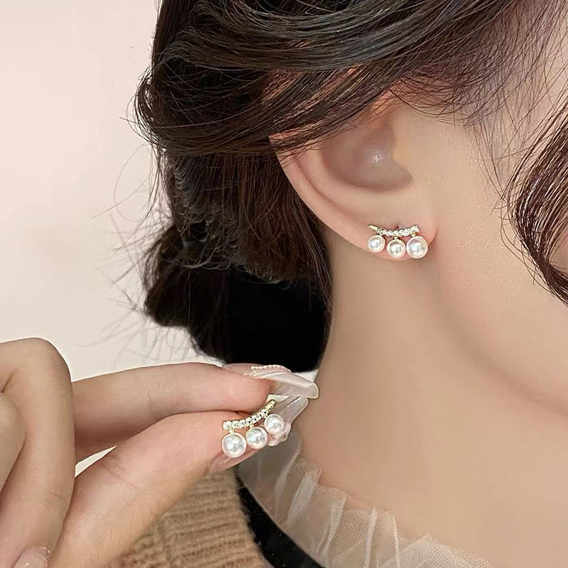 Anillo de metal francés aretes de anillo simple aretes de aretes nuevos estilos de estilo estilo estilo estilo de diseño de nicho temperamento único aretes de mujer cara pequeña