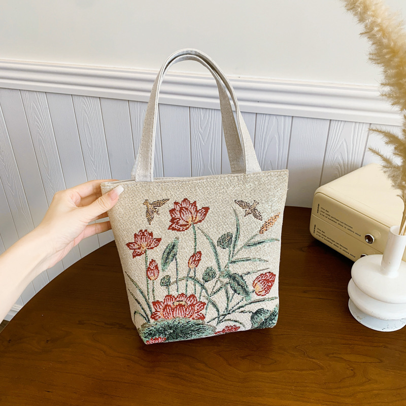 新しいファッショナブルで多用途なカジュアルな気質の女性のキャンバス両面ゴールデンシルクジャカード刺繍蝶ハンドバッグママバッグ|undefined