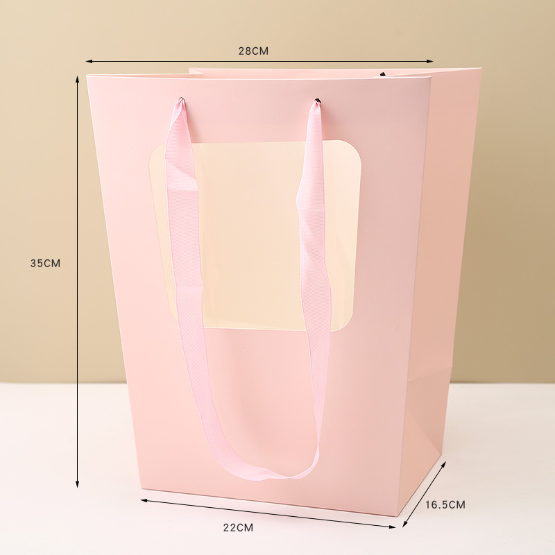 반쯤 열린 핑크 사다리꼴 핸드백; 22*16.5*28*35cm