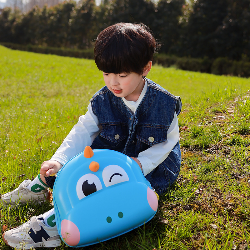Nueva mochila de jardín de infantes Dinosauro 3D concha dura bolsas de hombres y mujeres con cáscara de huevo en el parque súper lindo bolsas anti-sucio para niños